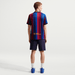 FC Barcelona 2026/27 home football jersey in blue and garnet Blaugrana - back view on model